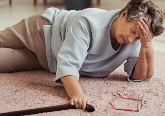 Older woman on floor after falling