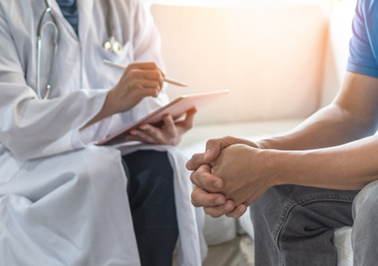 Patient and doctor having serious conversation