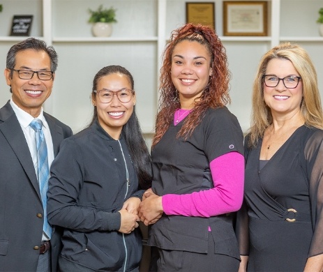 Doctor Lim & His Amazing Dental Team smiling